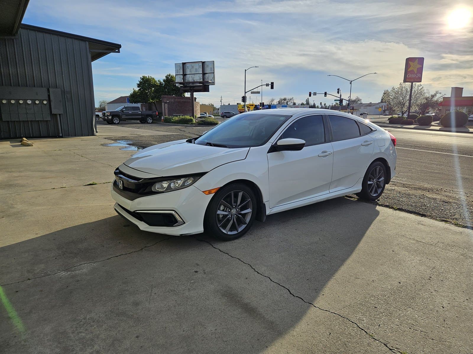 White Honda Civic after a complete exterior detail